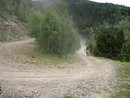 Steve about to take a typical hairpin corner on one of many serpentine dirt roads.