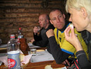 Paul, Martin and Nina appease the worst hunger with some bread.