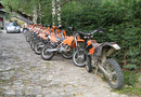 Our machines for the week, KTM 450 EXCs with Jens (or should I say "my", as I ended up riding it half of the tour...) bike (bored out to a 525) in the foreground.