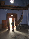 Being a bit early for lunch on day four, we stopped at a ghost town with a small church. Adrian is standing in the doorway as Jens is heading up the bell tower.